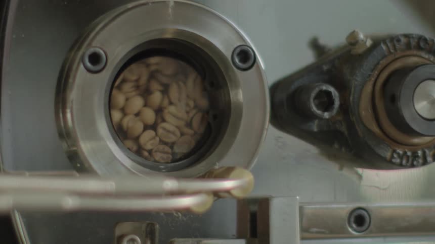 Coffee beans roasting in machine