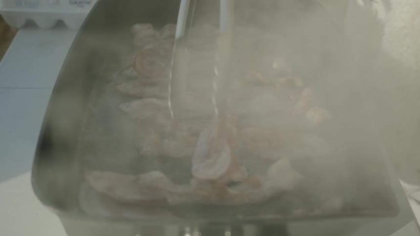 Meat being roasted in the pan