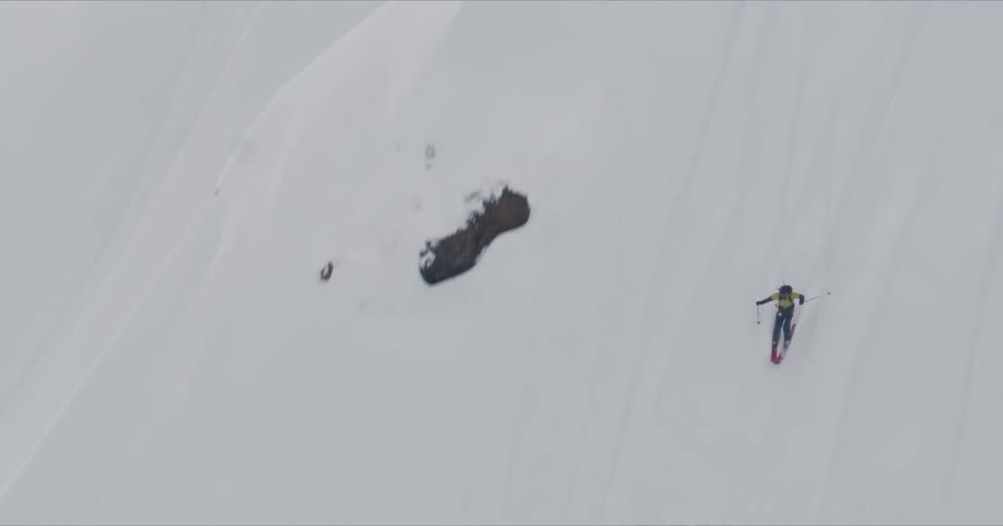 A person is skiing down a mountain