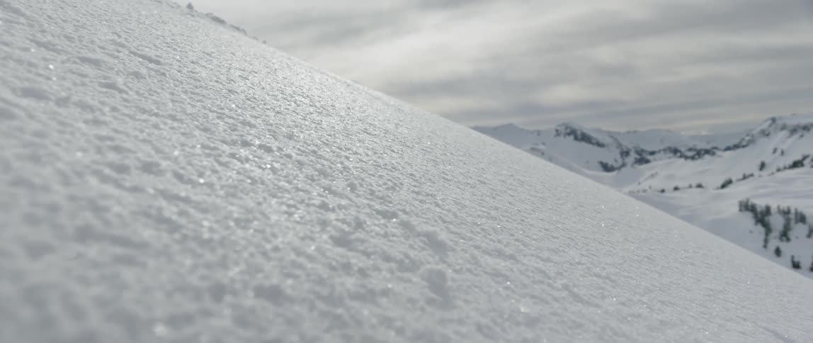 A close up view of snow landscape at the mountain