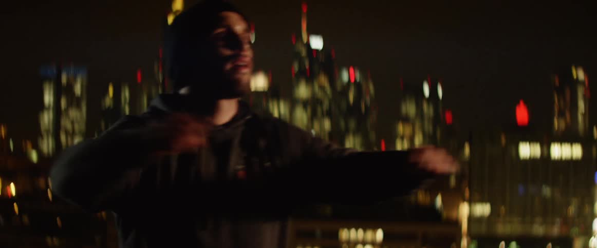 A man doing an exercise on the night
