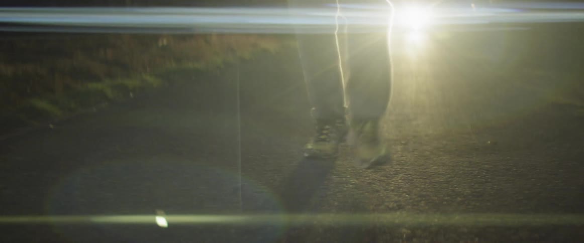 A man running while being chased