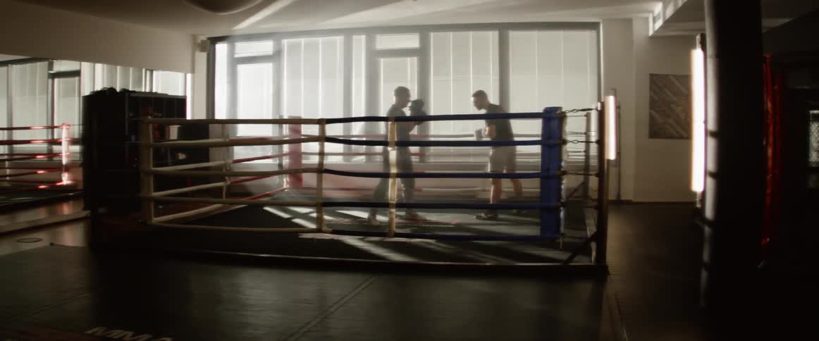 Men doing boxing exercise on the ring
