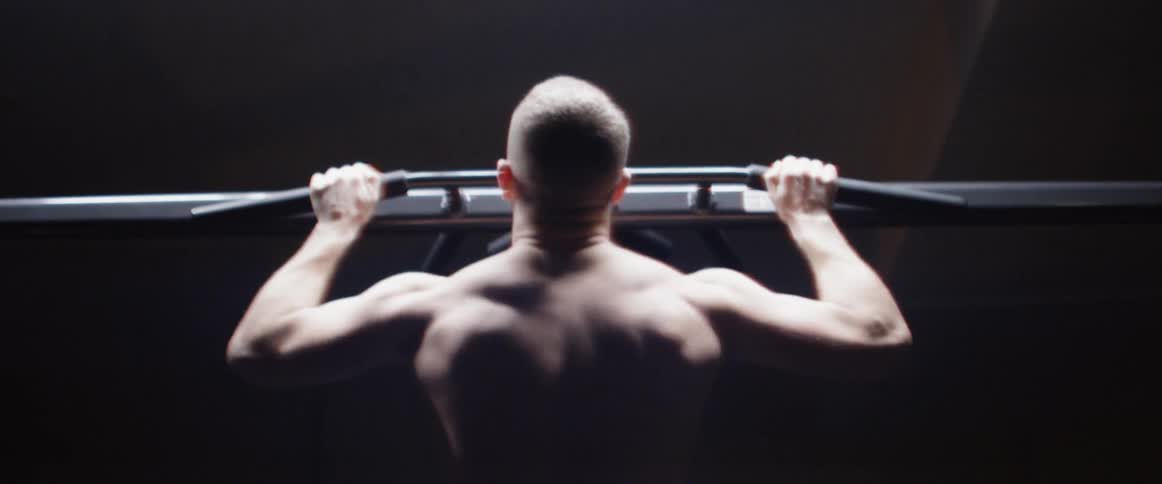 A man doing a pull up