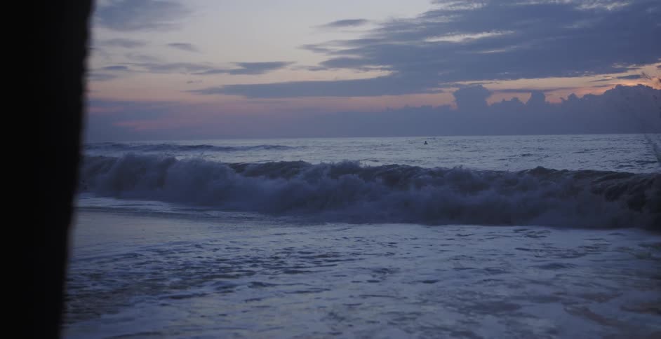 A footage of ocean waves hitting the beach