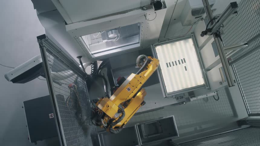 A yellow robot in action