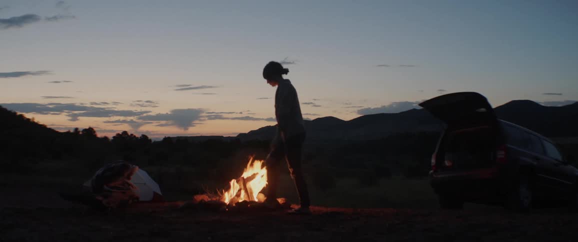 A woman camping alone