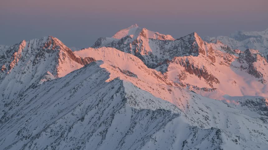 A scenery of rocky mountain apex at the dawn