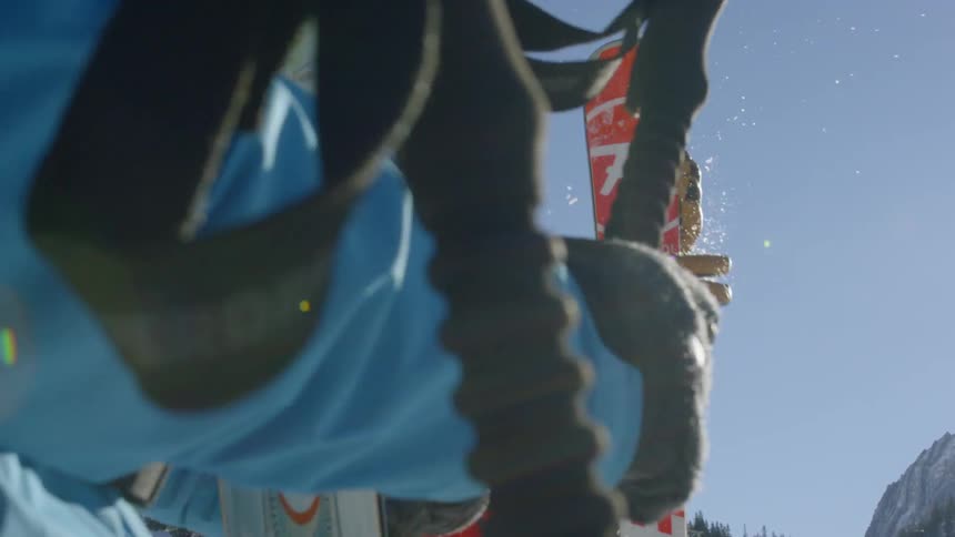 A man preparing his snowboard