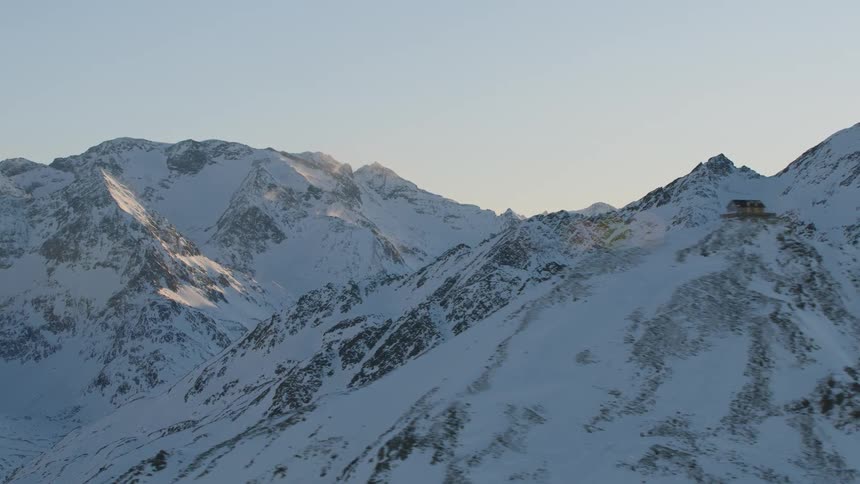 Snow capped mountain range covering a large area