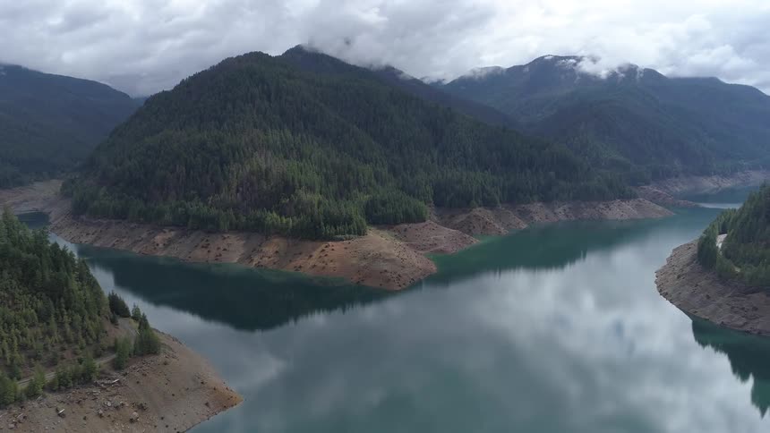 Rivers separate forest covered mountains