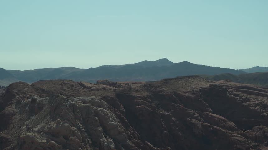 A scenery of a canyon and mountain range