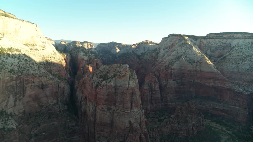 Streaked canyon walls lightly touched by sunlight