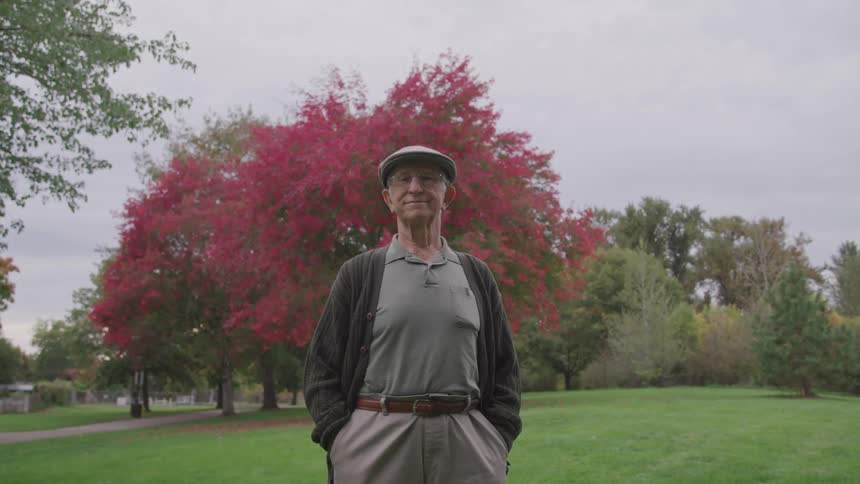 A man stands in the park
