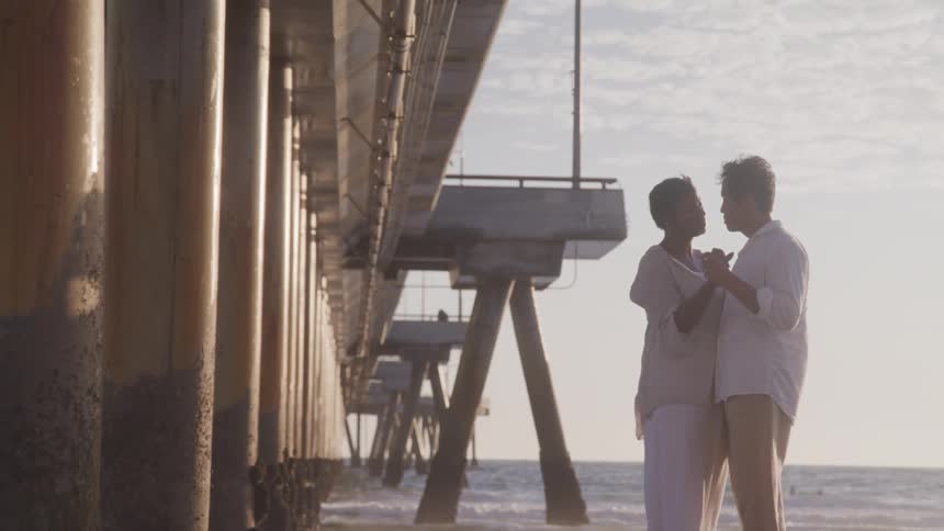 A couple dancing on the beach