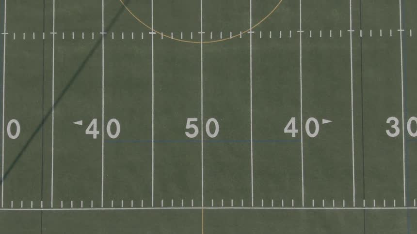 Empty football field during the day