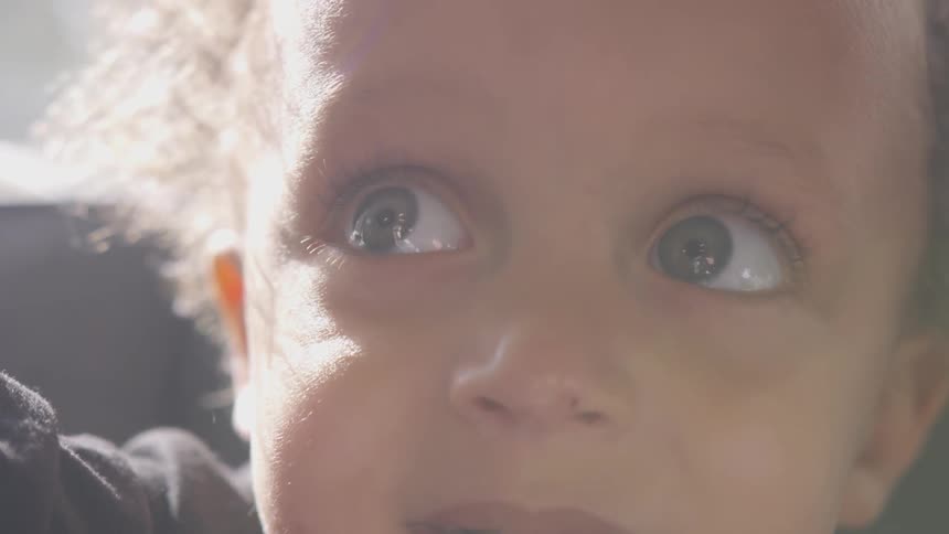 A child is looking around