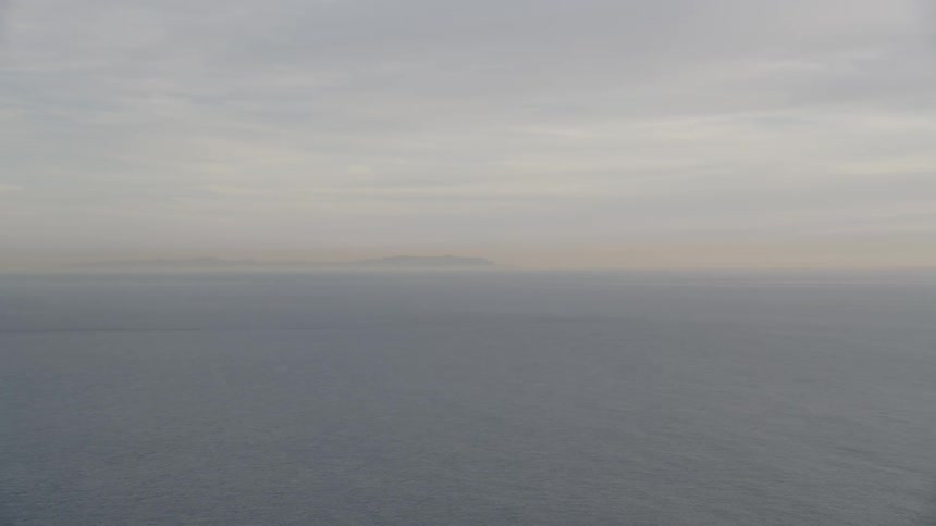 Ocean surface ripples under cloudy sky