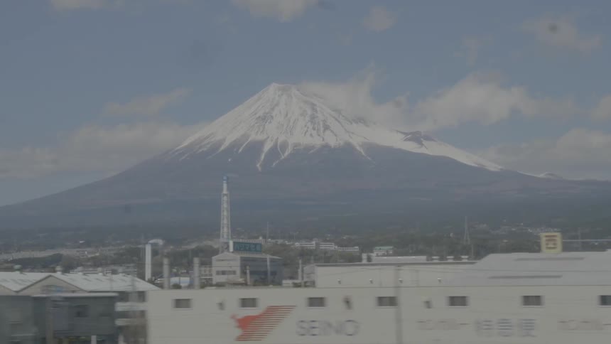 A scenery of a mountain seen from the city