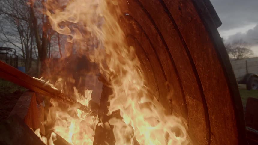 A flame burning an iron pieces
