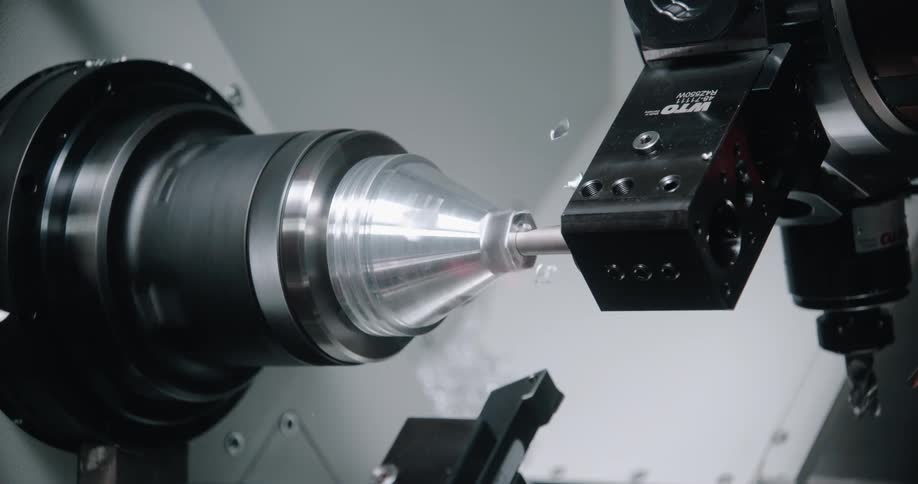 A mill is boring a hole in some aluminum