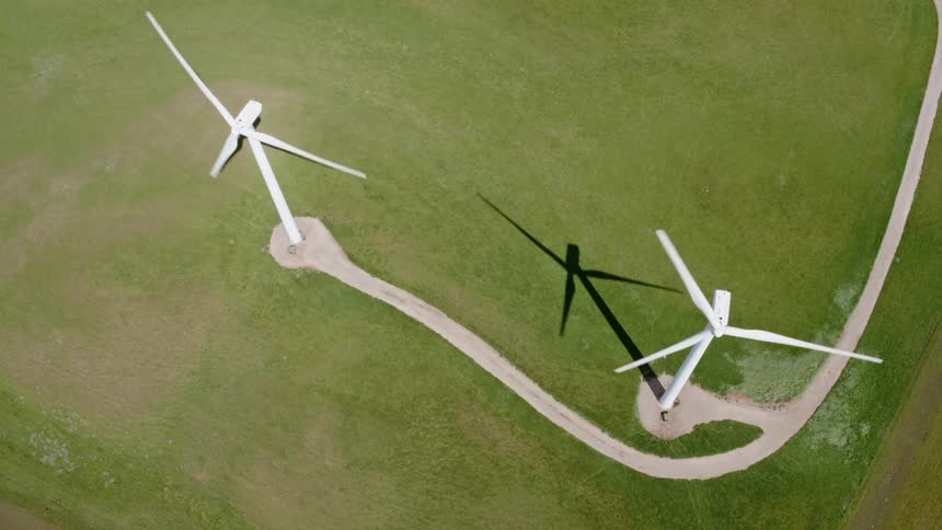 Wind turbines spin in the wind