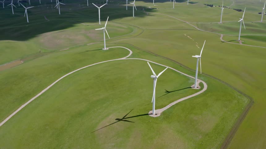Wind turbines on wind farm connected by roads