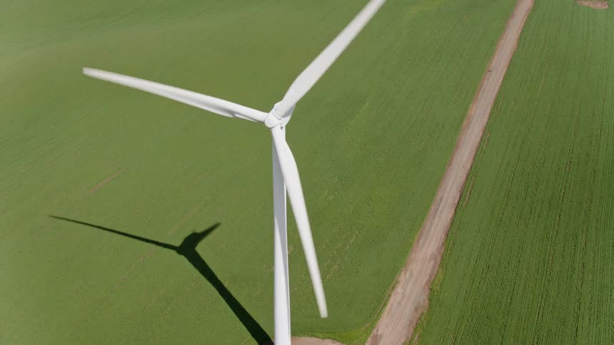 A wind turbine spins in the breeze