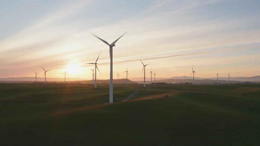 Wind turbines spin in the breeze