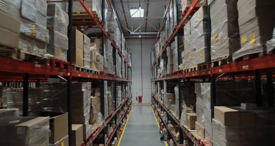 Pallet racking in a warehouse is full of boxes on pallets