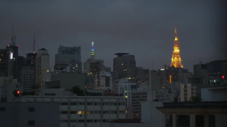 Lit up city buildings at night
