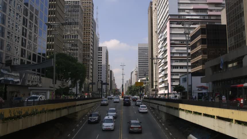 Vehicles moving on a busy city road