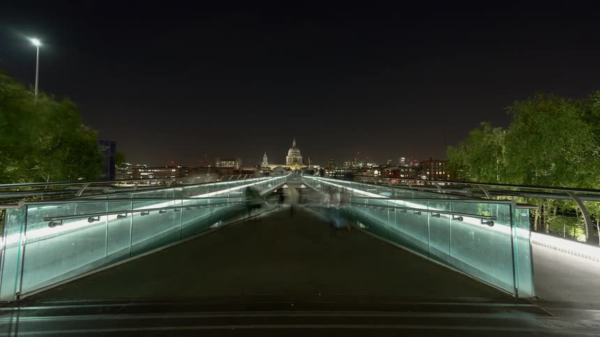 A walkway with buildings and the sky in the background