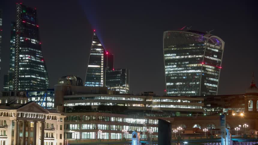 A city skyline at night with lights