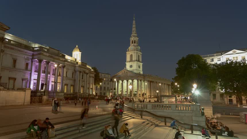 The people walk around the city at night