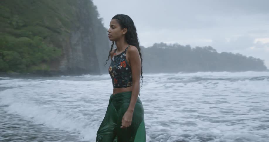 A woman walking on the beach