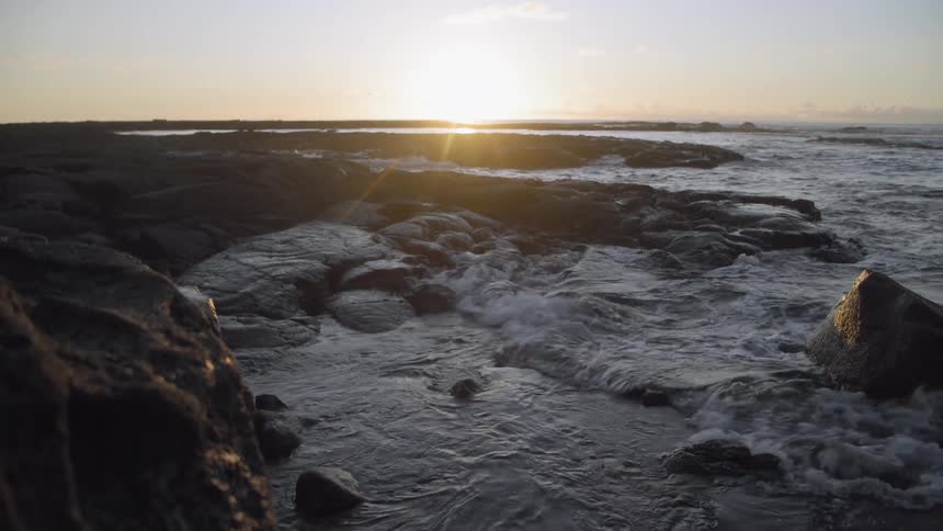 Waves hitting a rocky coastline