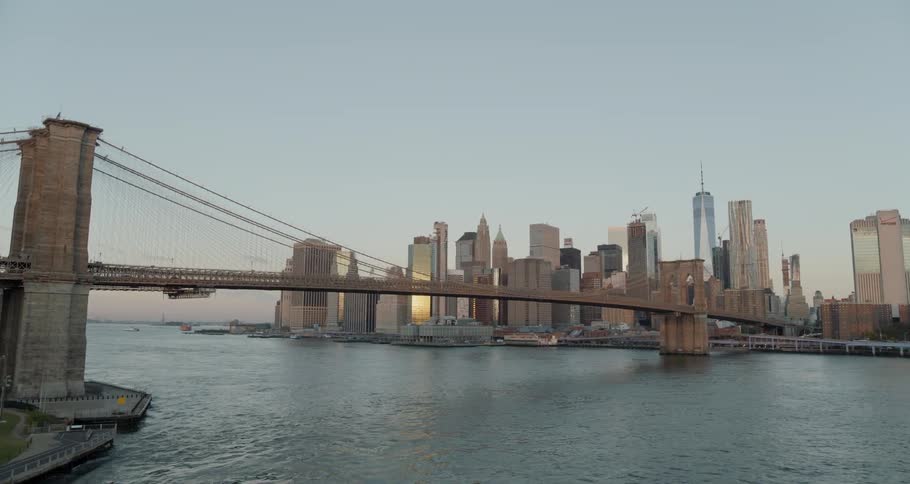 Aerial of bridge across the bay and waterfront ofcity skyline