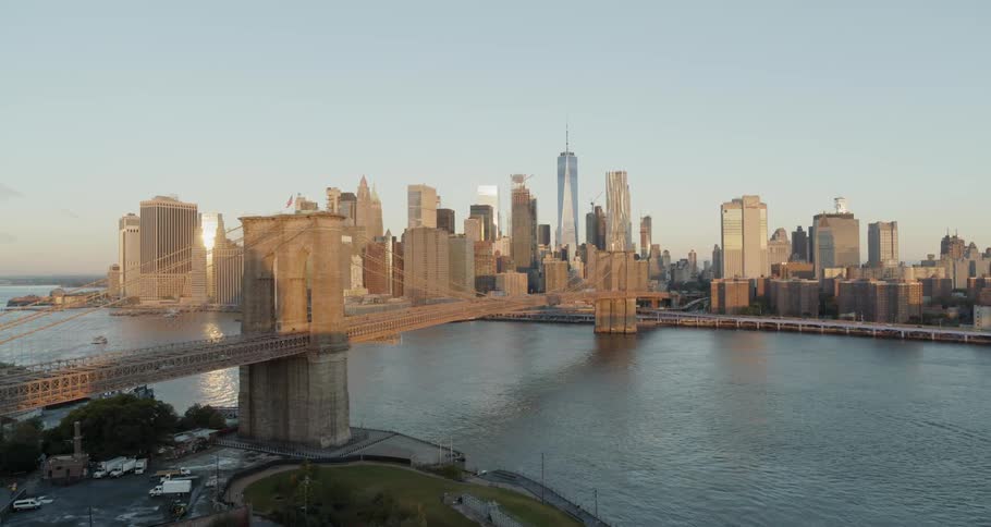 The large bridge leads to the large city