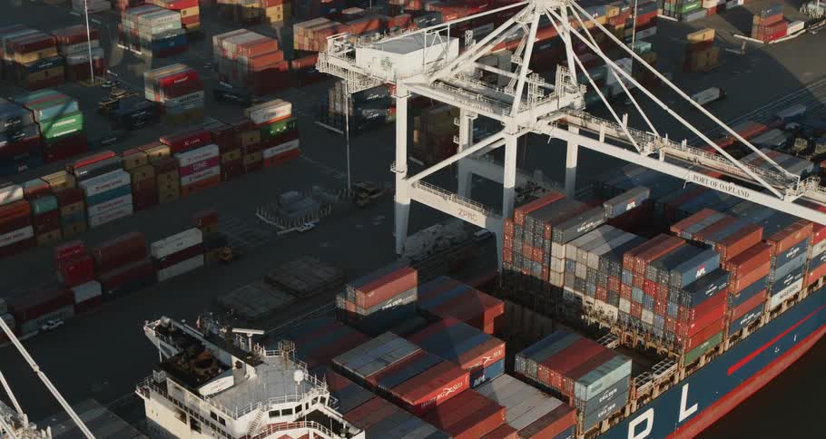 Shipping containers stacked high on a ship