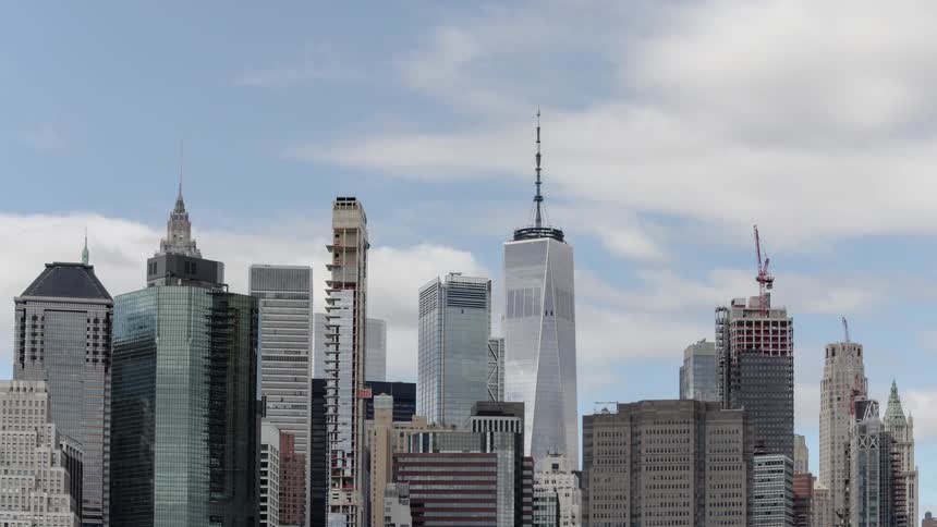 Clouds stream over a sky scrapers