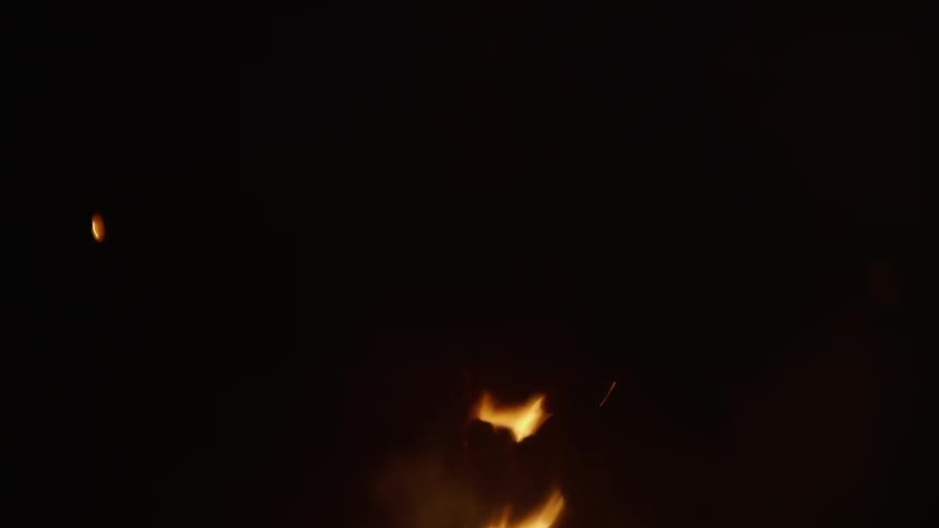 Flames rise and sparks fly