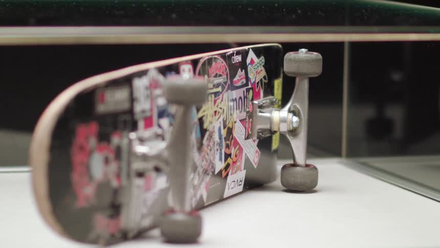 Skateboard exhibited in glass box in the exhibition