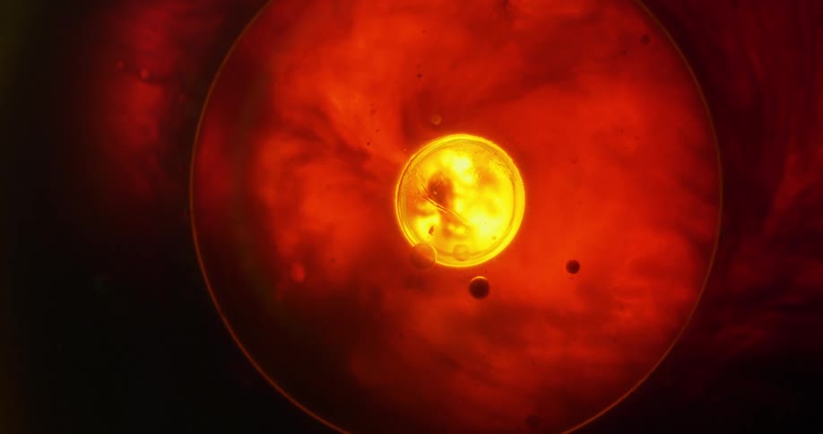 Small yellow bubble forms in large orange one