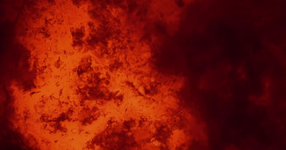 Darker orange particles float in light orange liquid