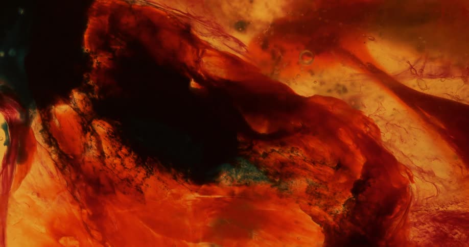 Orange yellow black and green colors move like liquid