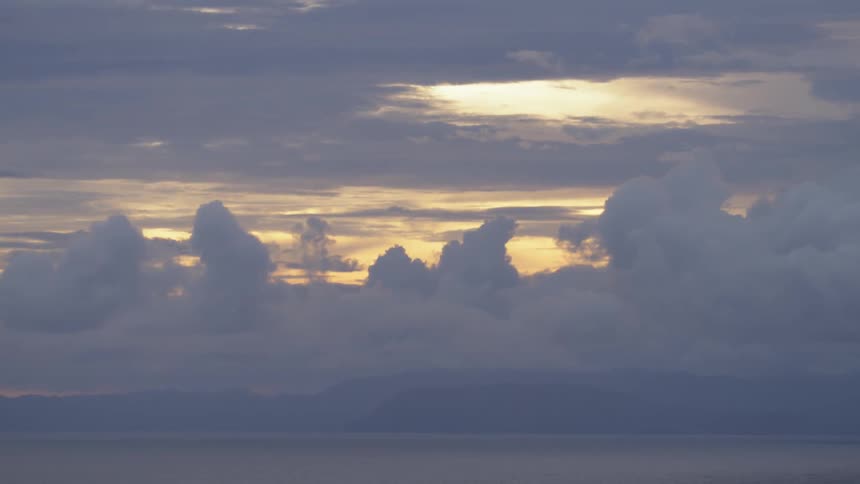 Clouds with sunlight and the sky in the background