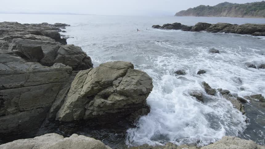 Waves crashing towards the shoreline