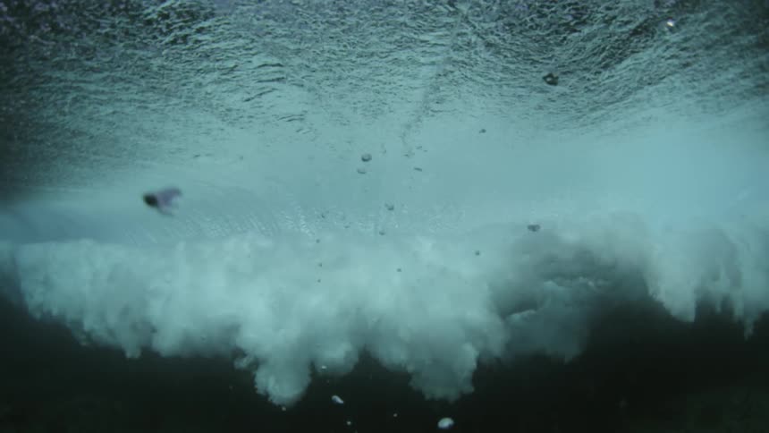 Underwater ocean wave crashing