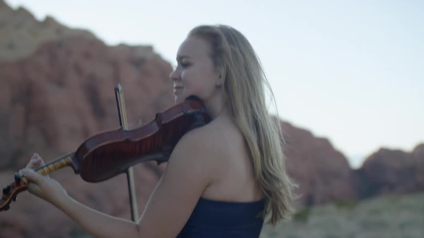 A woman plays the violin